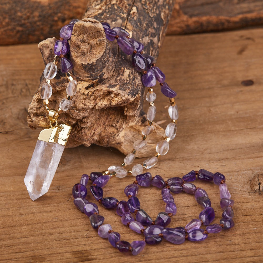 Experience the beauty of nature with Fiong Mma's Gemstone Necklace - a perfect gift for your loved ones! This handcrafted necklace features natural crystals and gemstones, such as amethyst, rose quartz, and turquoise, adding a touch of elegance and spirituality to any outfit. Each gemstone is thoughtfully selected for its unique energy and healing benefits, making it a meaningful gift for those seeking to enhance their spiritual journey.