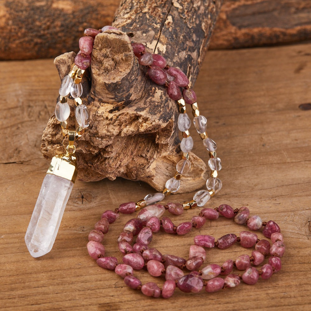 Experience the beauty of nature with Fiong Mma&#39;s Gemstone Necklace - a perfect gift for your loved ones! This handcrafted necklace features natural crystals and gemstones, such as amethyst, rose quartz, and turquoise, adding a touch of elegance and spirituality to any outfit. Each gemstone is thoughtfully selected for its unique energy and healing benefits, making it a meaningful gift for those seeking to enhance their spiritual journey.