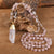 Experience the beauty of nature with Fiong Mma's Gemstone Necklace - a perfect gift for your loved ones! This handcrafted necklace features natural crystals and gemstones, such as amethyst, rose quartz, and turquoise, adding a touch of elegance and spirituality to any outfit. Each gemstone is thoughtfully selected for its unique energy and healing benefits, making it a meaningful gift for those seeking to enhance their spiritual journey.